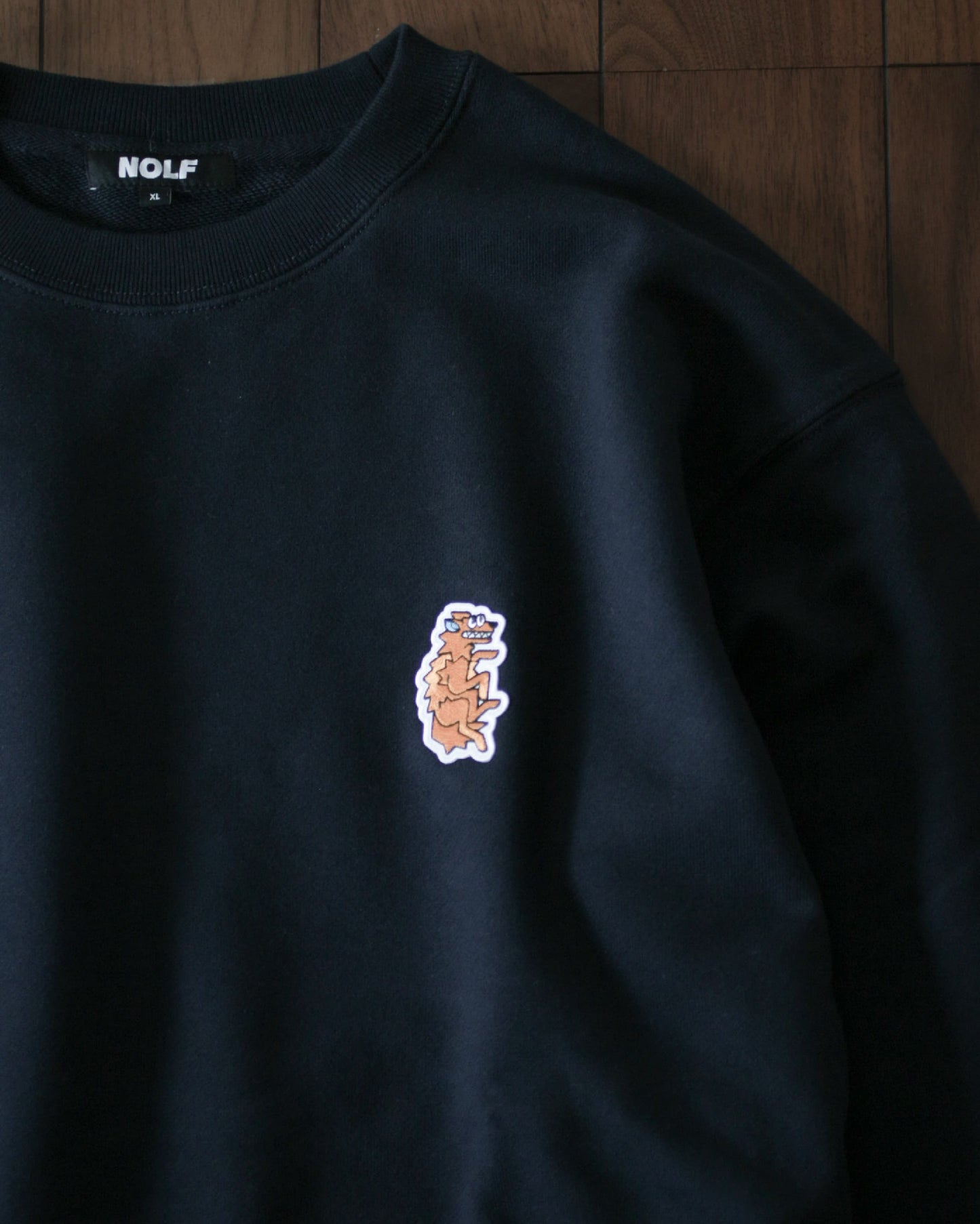 WOLF PATCH CREWNECK SWEATSHIRT